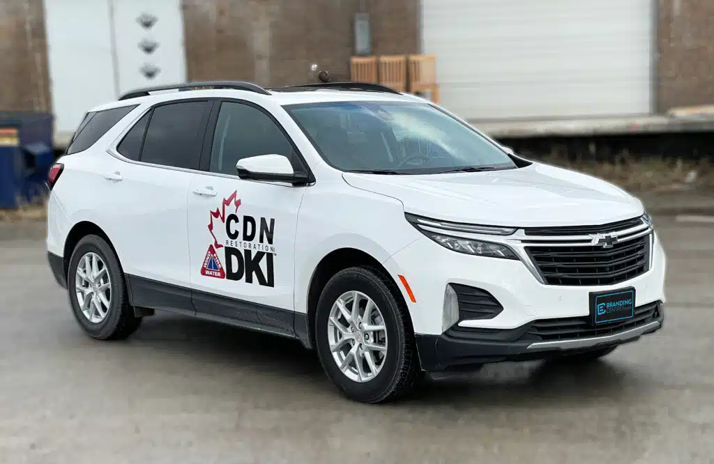 Side view of Chevrolet Equinox featuring lettering and decals installed by Branding Centres
