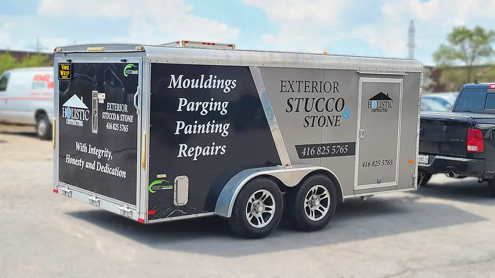 Holistic trailer lettering decal on enclosed trailer using 3M and Avery Dennison vinyl
