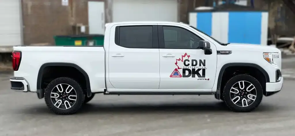 Side view of GMC Sierra showcasing lettering and decals installed by Branding Centres