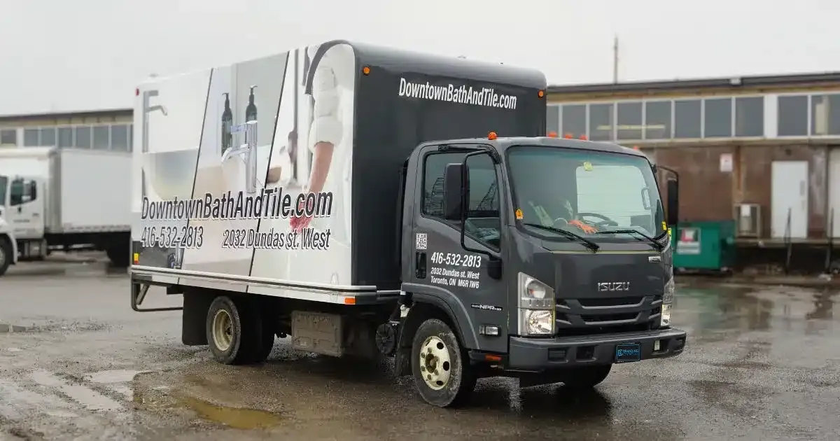 Downtown Bath & Tiles - Isuzu - NPR Box Truck Full Wrap - After - Front Side Angle
