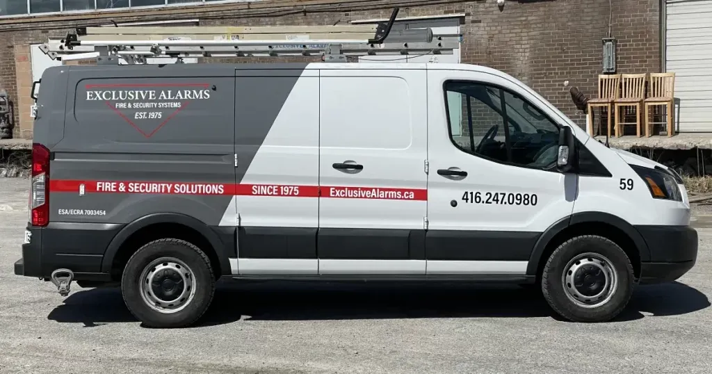 Ford Transit Partial Van Wrap for Exclusive Alarms - After - Side View