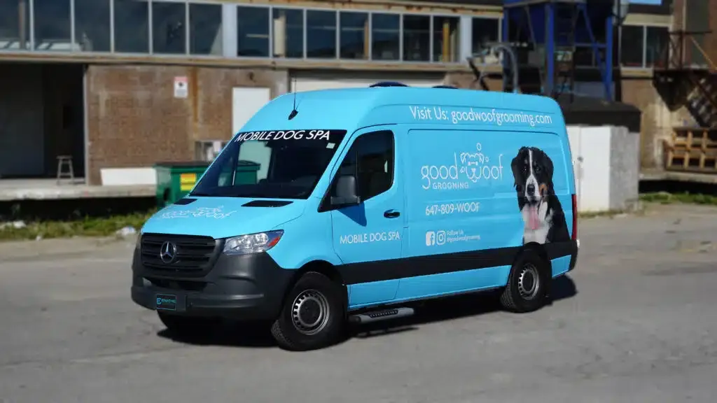 Rear angle of 2020 Mercedes Metris with full wrap design for GoodWoof