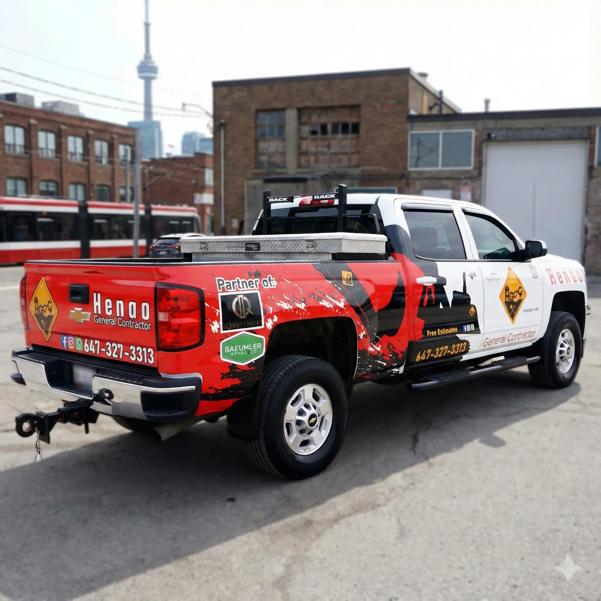 Partial truck wrap showcasing Henao General Contractor branding
