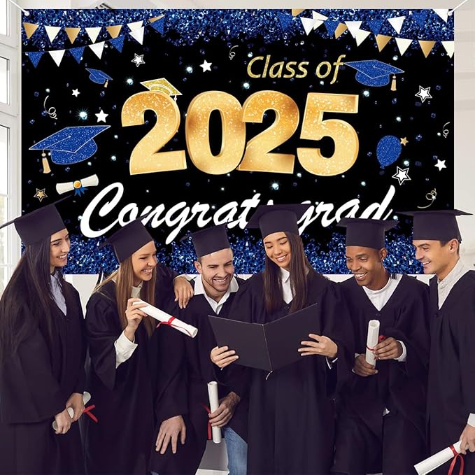 Graduation celebration with six graduates in caps and gowns, holding diplomas, in front of a festive banner