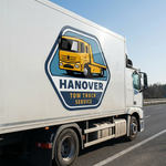 White truck with Hanover company logo sticker on side