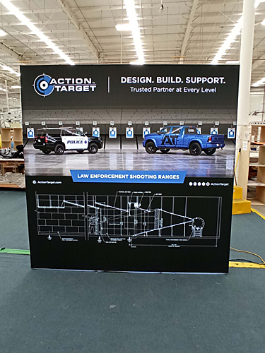 Popup banner showing Action Target logo and company information.