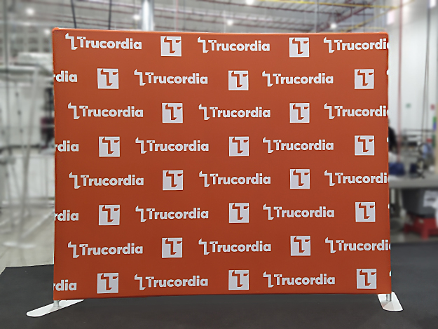 Trucordia white logo staggered on orange background pop up