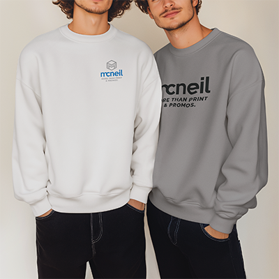 Photograph showing two young men wearing company branded sweatshirts.