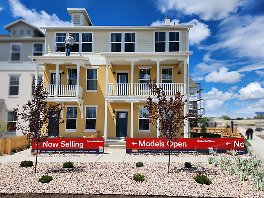 Open house banners on new construction home.