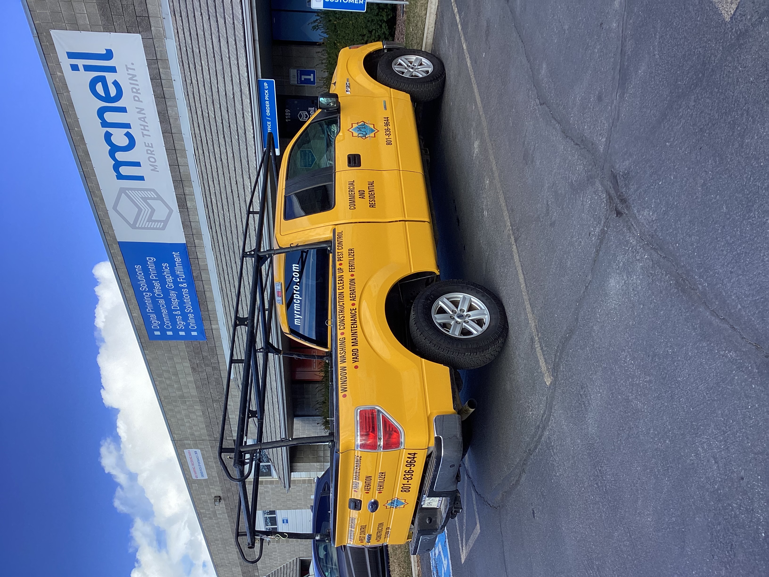 Yellow truck with black vinyl for info.