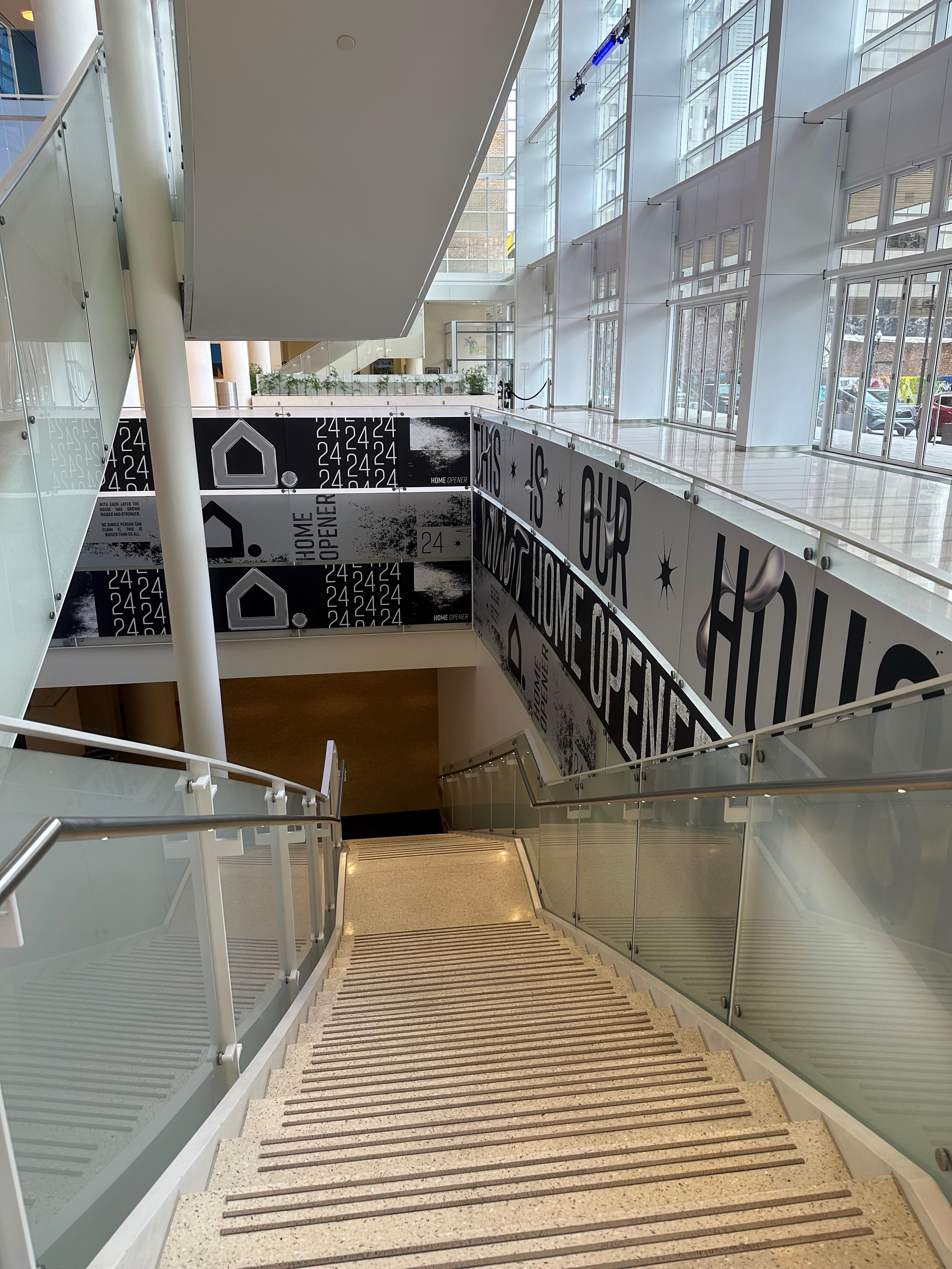 Stairwell with vinyl on the glass surrounding it.