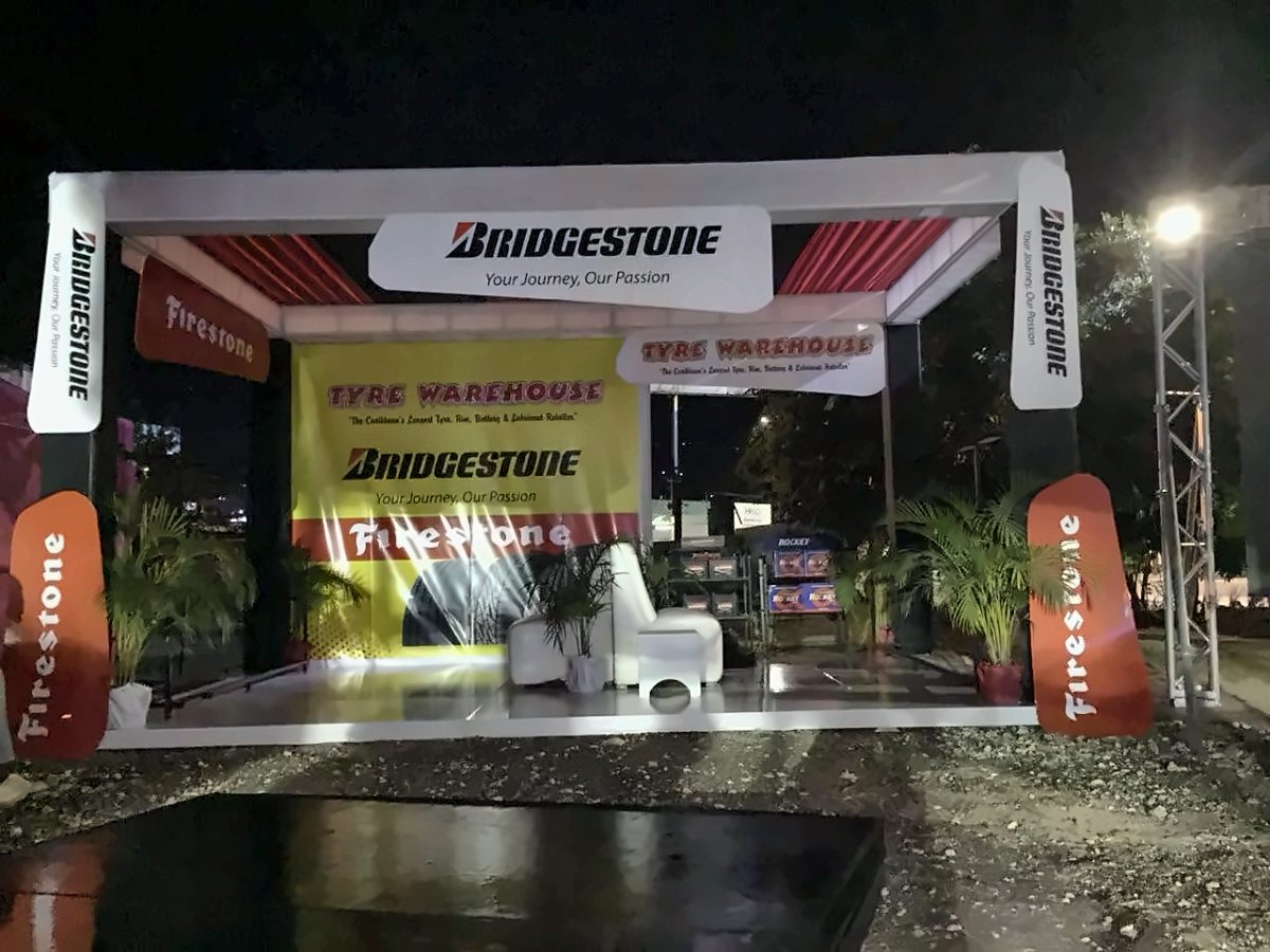 Bridgestone and Tyre Warehouse activation booth at night