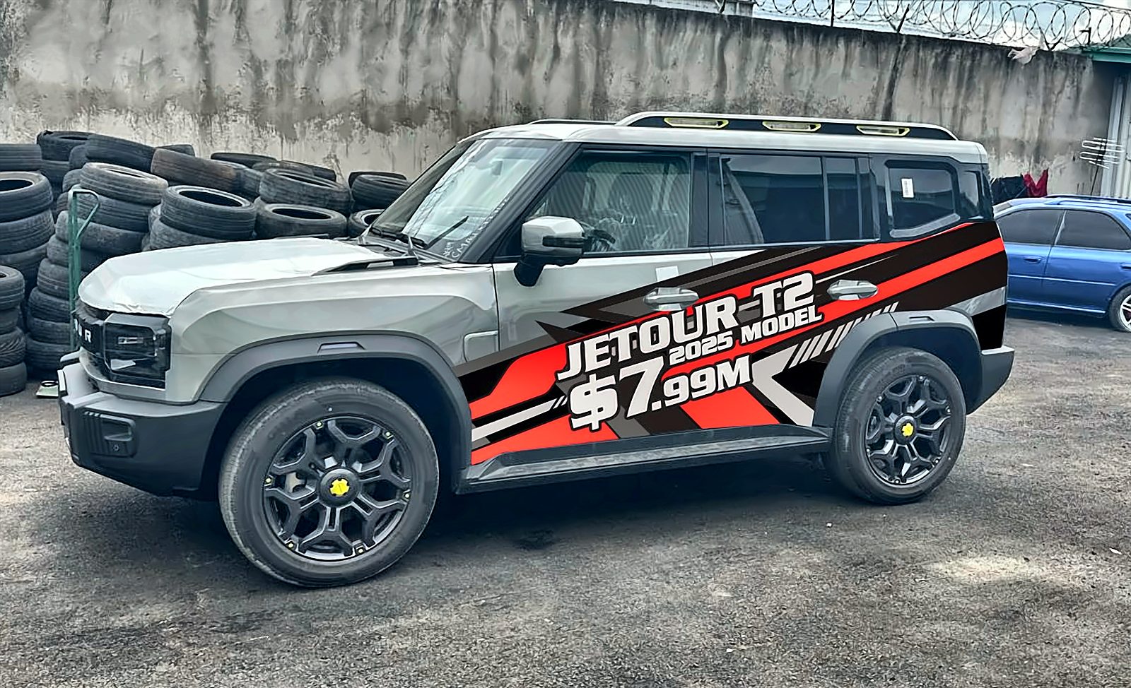 Jetour T2 SUV with red and black launch graphics designed and installed by Print Big