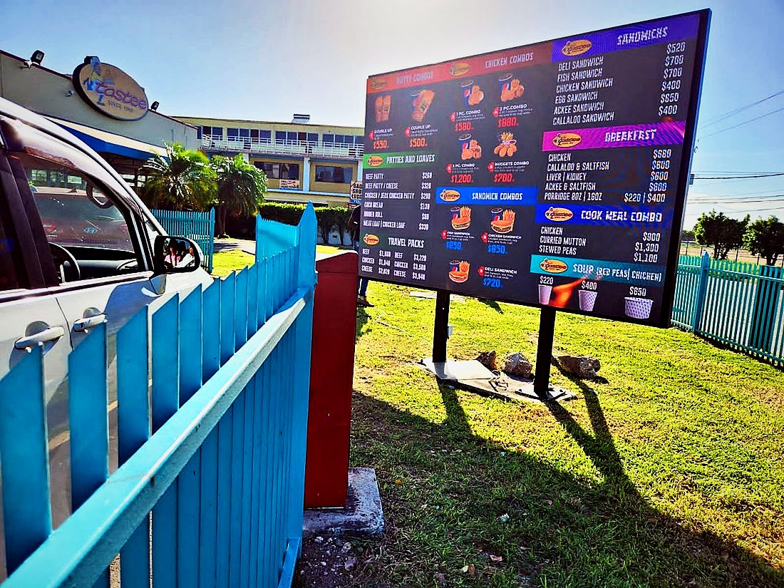 Roadside menu board on posts