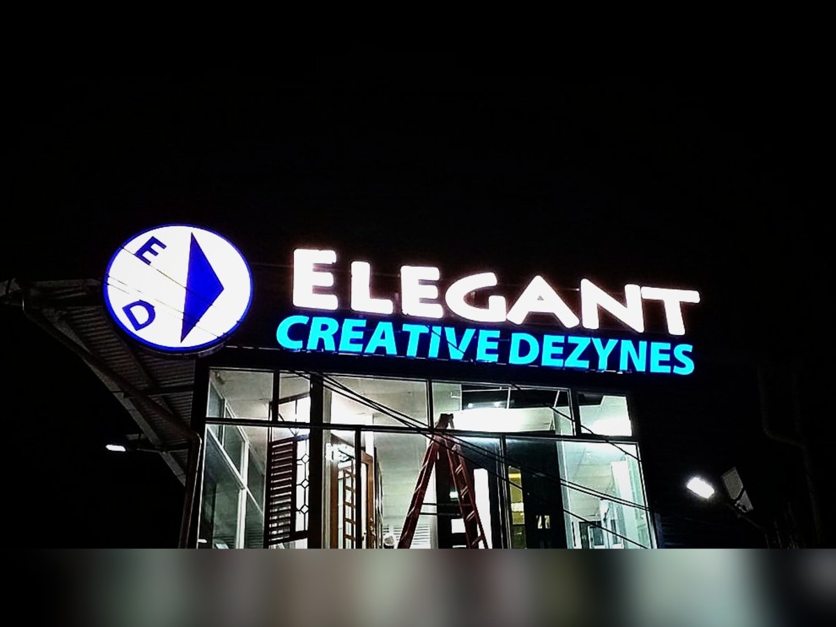 Lit building sign · Elegant Creative Dezynes