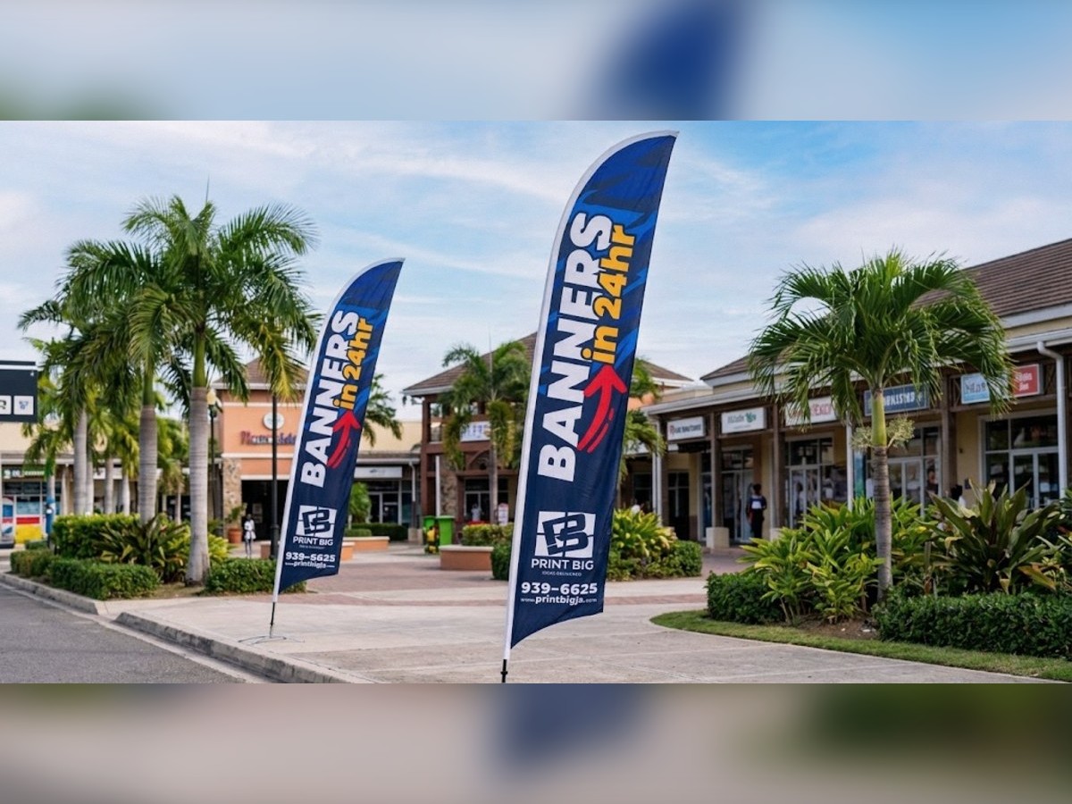 Feather flags at a plaza entrance · Print Big, Portmore