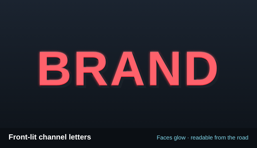 Front-lit channel letters glowing at night
