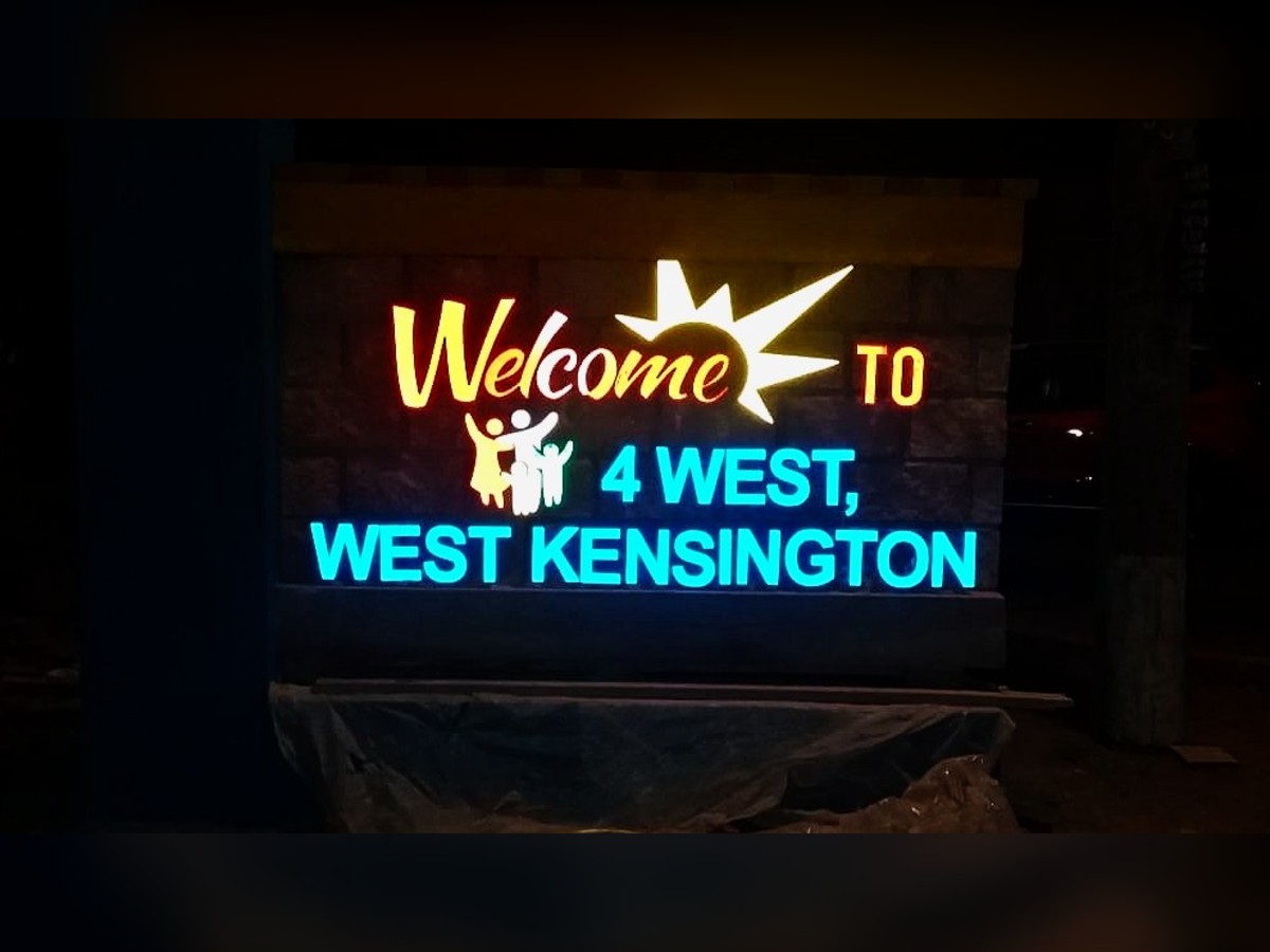 Lit community sign · 4 West, West Kensington