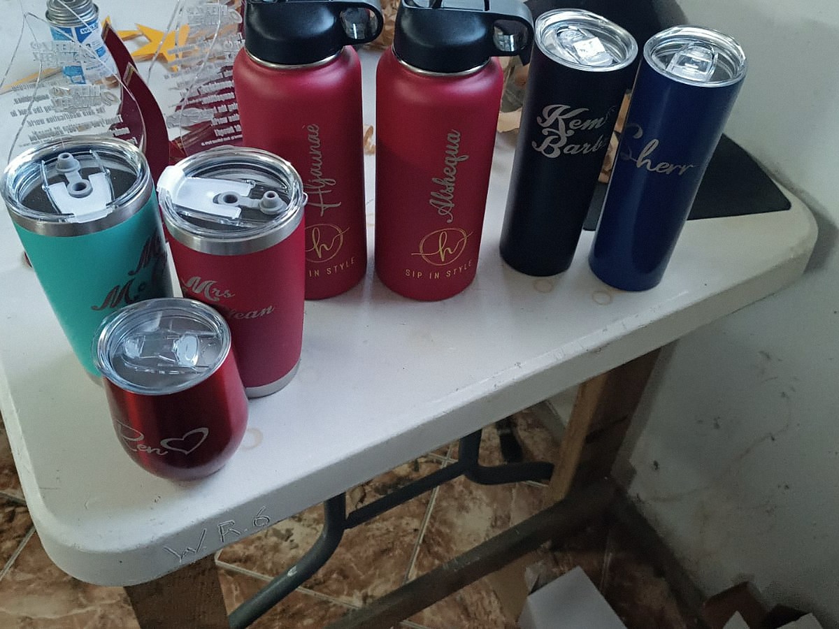 Personalised tumblers and bottles, etched with names (real job)