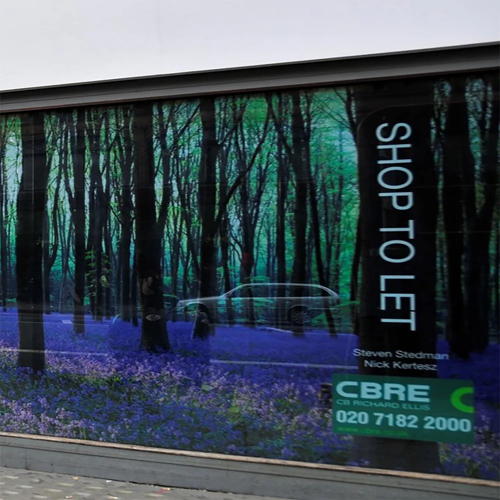 https://d2tl9ctlpnidkn.cloudfront.net/printshap/images/product/Perforated_Window_Film_Window_Graphics_.jpg