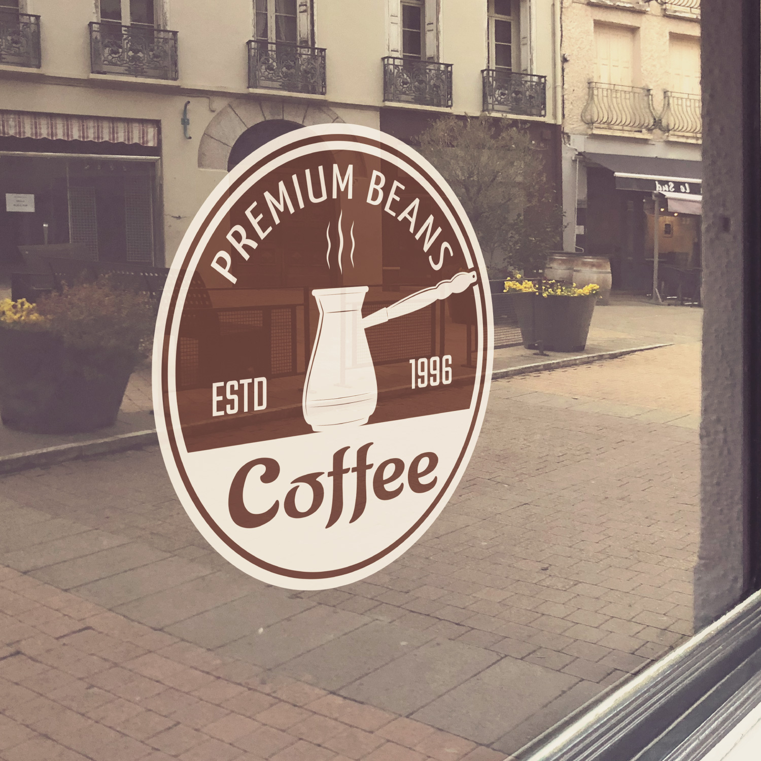 Angled view of a window with a static cling decal installed to show detail