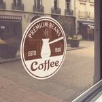 Angled view of a window with a static cling decal installed to show detail